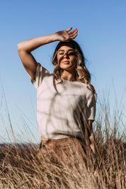 A model wearing the Blair Short Sleeve Cotton Knit in colour Vinwhite (White), from the front, showing the whole outfit