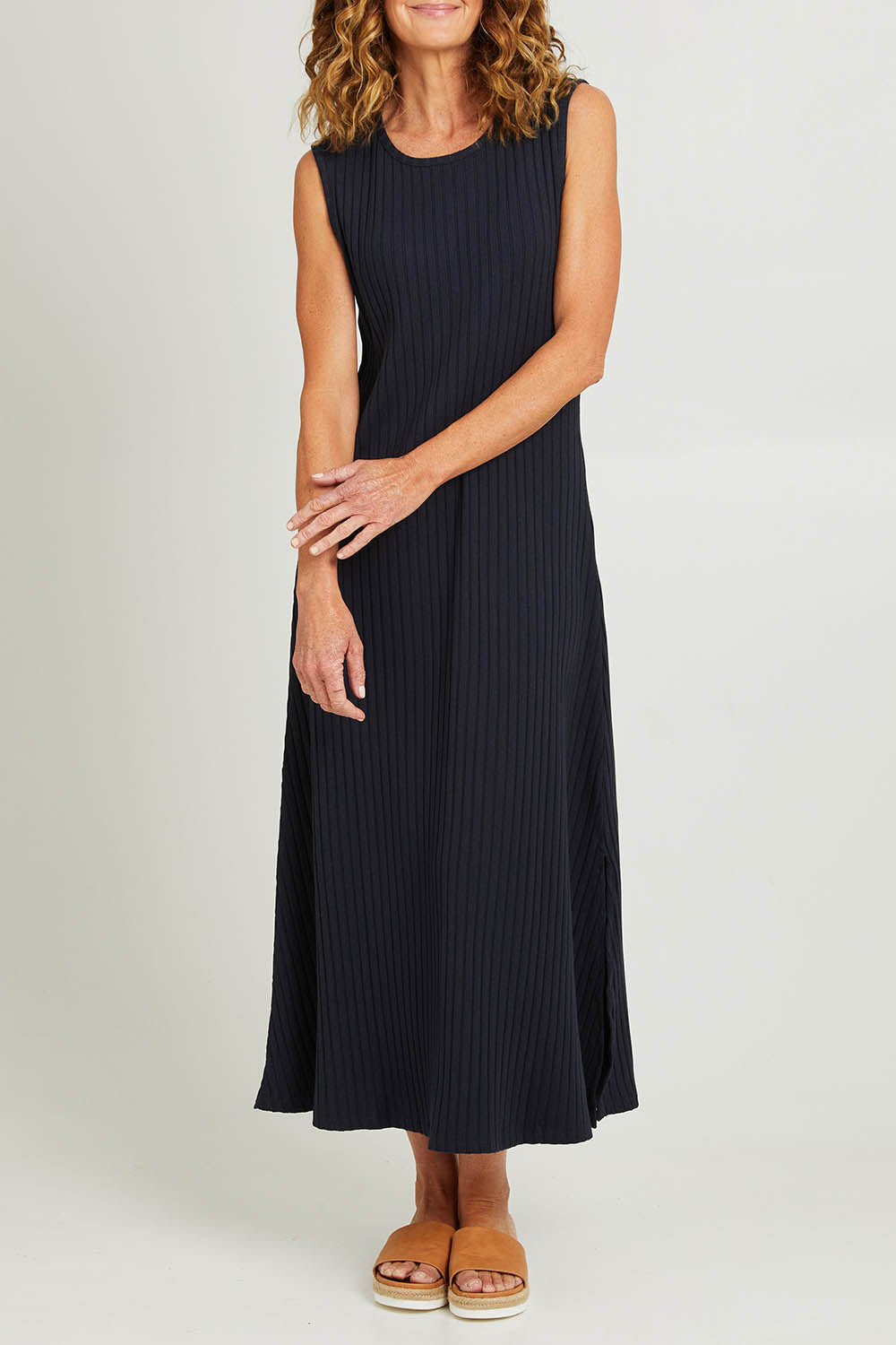 Model Emma wearing size 10 of the Pippa Rib Dress in colour Navy (Blue), from the front, cropped image