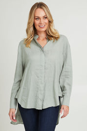 Model Grace wearing size 10 of the Sorrento Shirt in colour Sagegreen (Green), from the front, cropped image