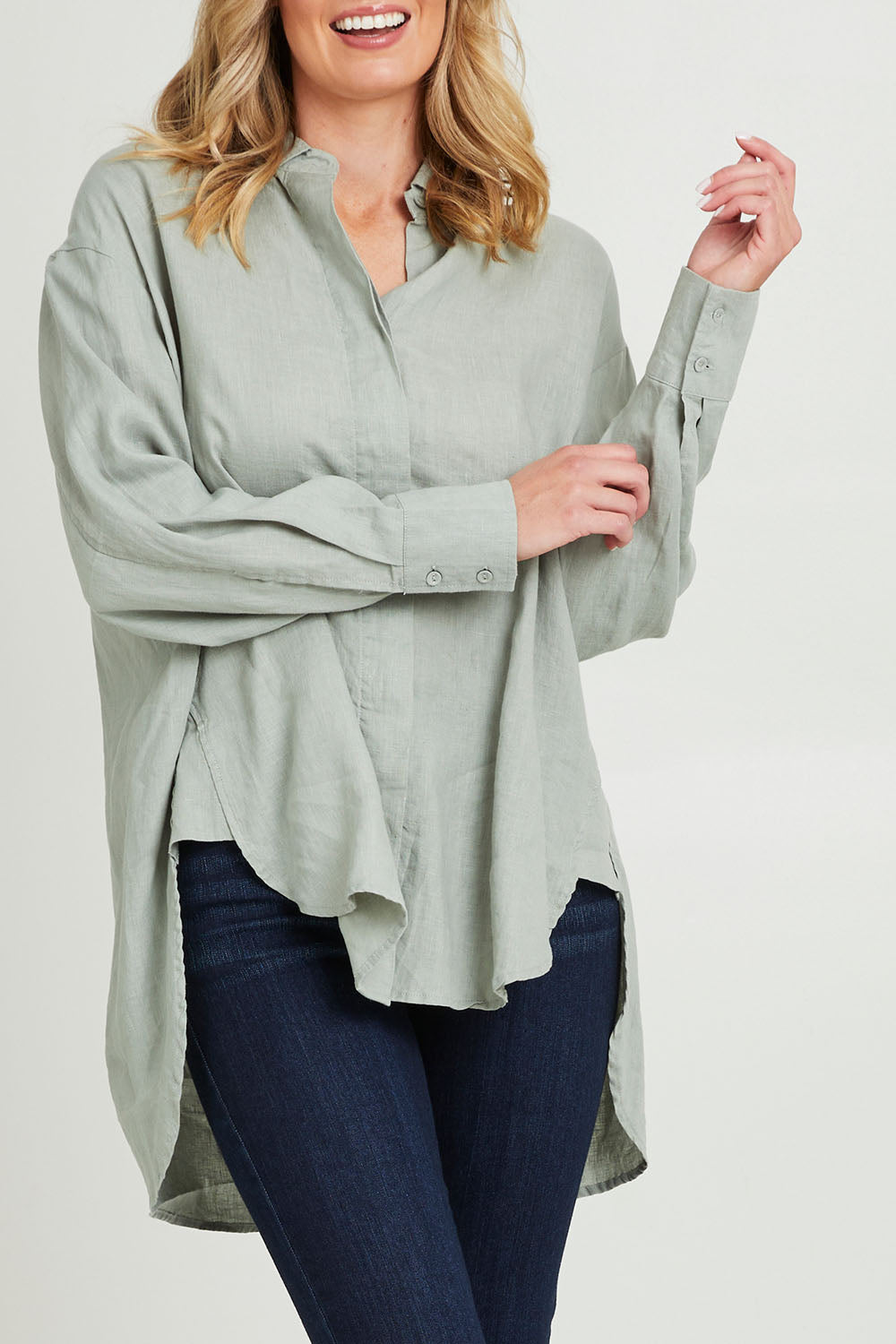 Model Grace wearing size 10 of the Sorrento Shirt in colour Sagegreen (Green), from the front, cropped image
