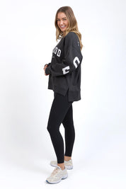 A model wearing the Interval Cotton Crew in colour Darkgrey (Grey), from the front, showing the whole outfit
