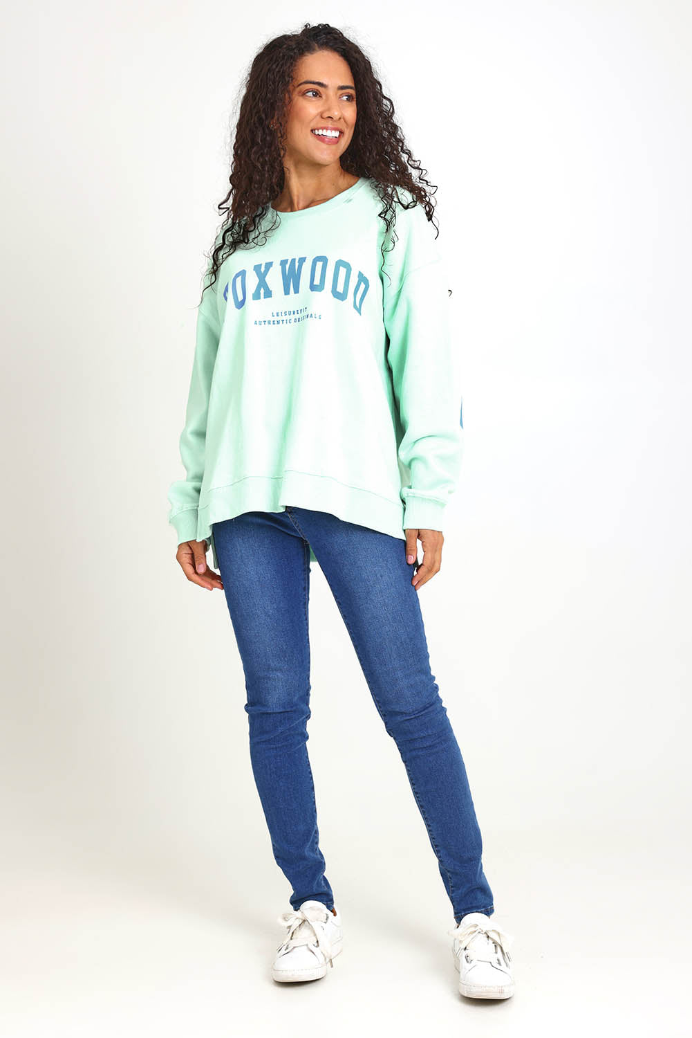 Model Pamelar wearing size 10 of the Elements Interval Cotton Crew – Mint in colour Mint, from the front