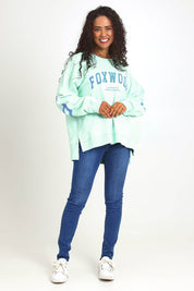 Model Pamelar wearing size 10 of the Elements Interval Cotton Crew – Mint in colour Mint, from the front