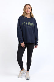 A model wearing the Interval Cotton Crew in colour Navy (Blue), from the front, showing the whole outfit