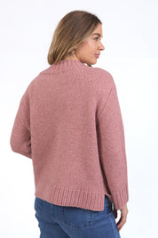 A model wearing the Pepper Knit in colour Rosepink (Pink), from the back