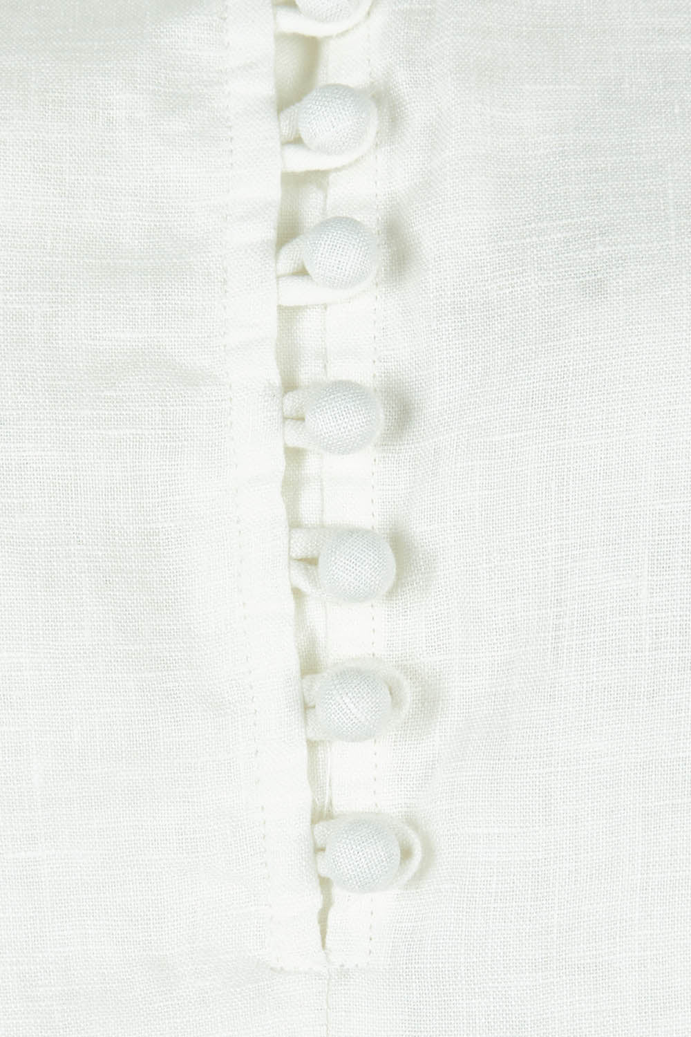 Product shot of the Corsica Blouse in colour Vinwhite (White), detail