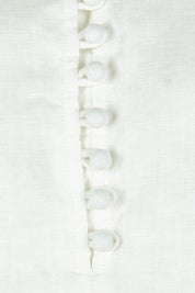 Product shot of the Corsica Blouse in colour Vinwhite (White), detail