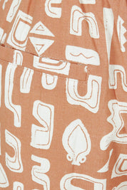 Product shot of the Etched Geo Pant in colour Clay, detail