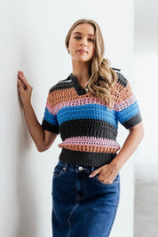 A model wearing the Gazelle Cotton Stripe Knit in colour Multi (Black), from the front, showing the whole outfit