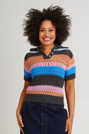 Model Olivia wearing size 10 of the Gazelle Cotton Stripe Knit in colour Multi (Black), from the front, cropped image