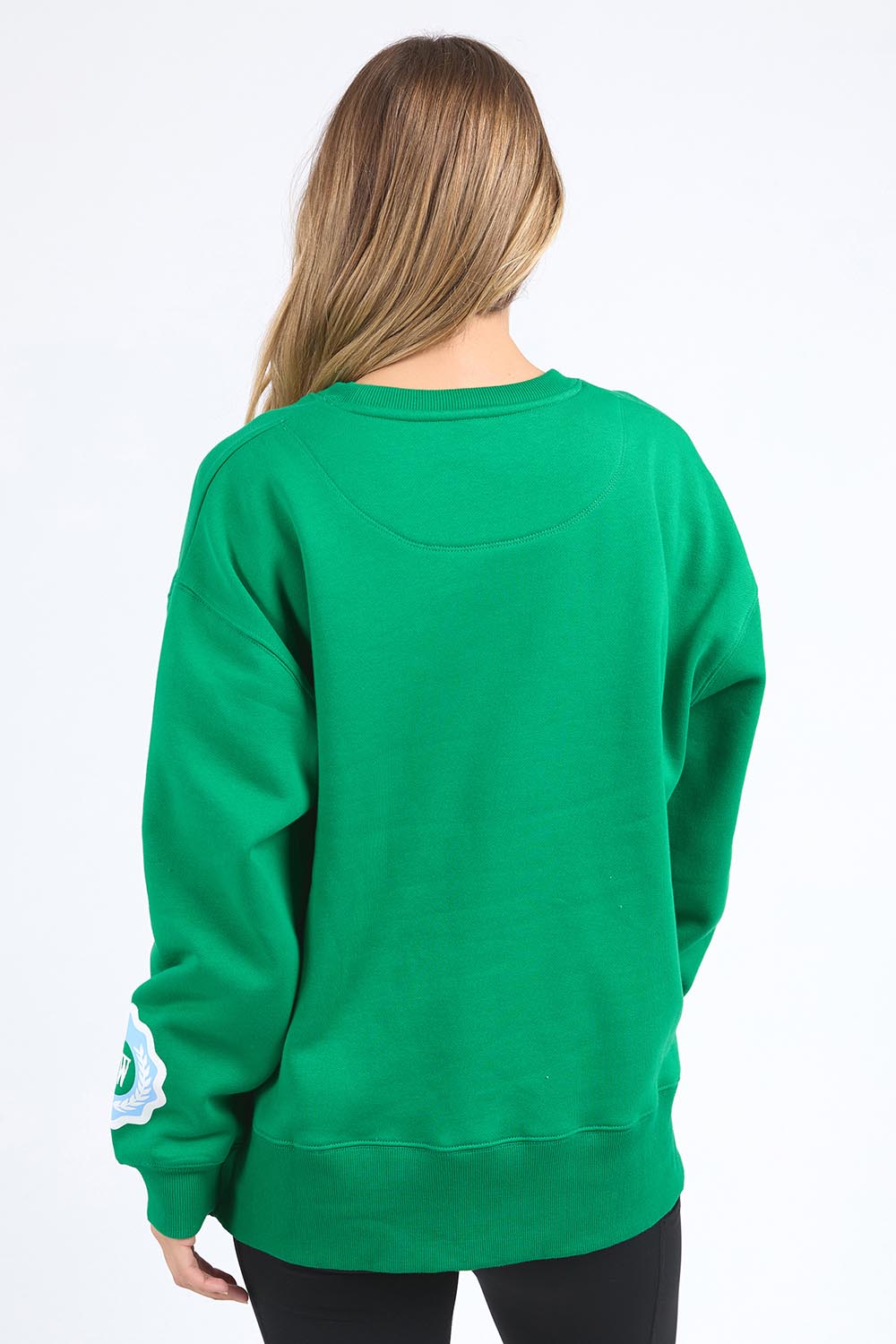 A model wearing the State League Cotton Crew in colour Green (Green), from the back