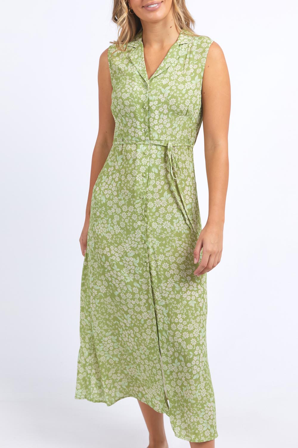 A model wearing the Antayla Floral Dress in colour Lgreen (Green), from the front, cropped image