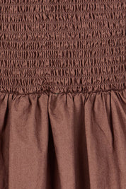 Product shot of the Esmerelda Cotton Dress in colour Chocolate, detail