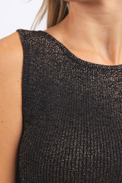 A model wearing the Tessa Metallic Knit Tank in colour Black (Black), from the front, cropped image