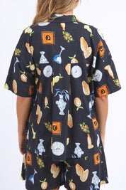 A model wearing the Italian Summer Linen Blend Shirt in colour Print (Black), from the back
