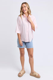 A model wearing the Leah Linen Blend Shirt in colour Palepink (Pink), from the front, showing the whole outfit