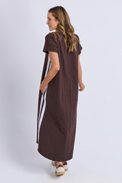 A model wearing the Leisure Recovery Cotton Dress in colour Chocolate, from the back