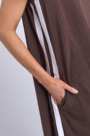 A model wearing the Leisure Recovery Cotton Dress in colour Chocolate, from the front, cropped image