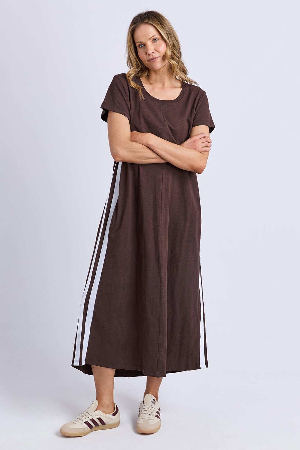 A model wearing the Leisure Recovery Cotton Dress in colour Chocolate, from the front, showing the whole outfit