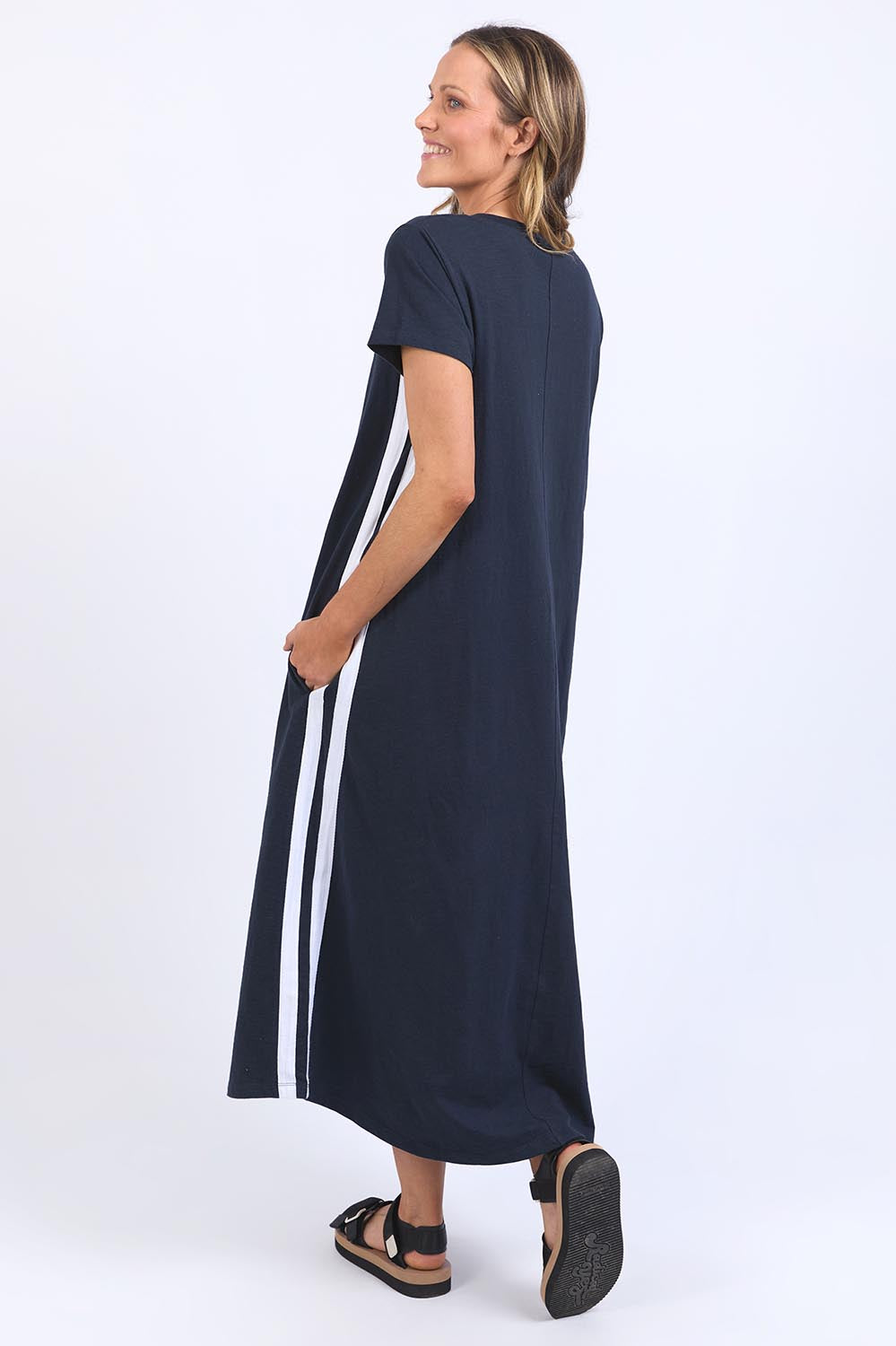 A model wearing the Leisure Recovery Cotton Dress in colour Navy (Blue), from the back