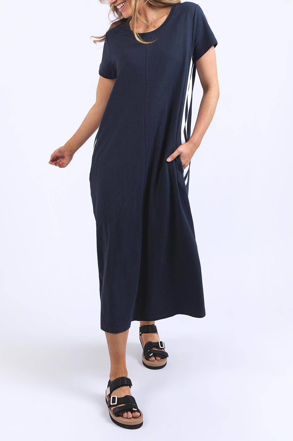 A model wearing the Leisure Recovery Cotton Dress in colour Navy (Blue), from the front, cropped image