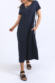 A model wearing the Leisure Recovery Cotton Dress in colour Navy (Blue), from the front, cropped image