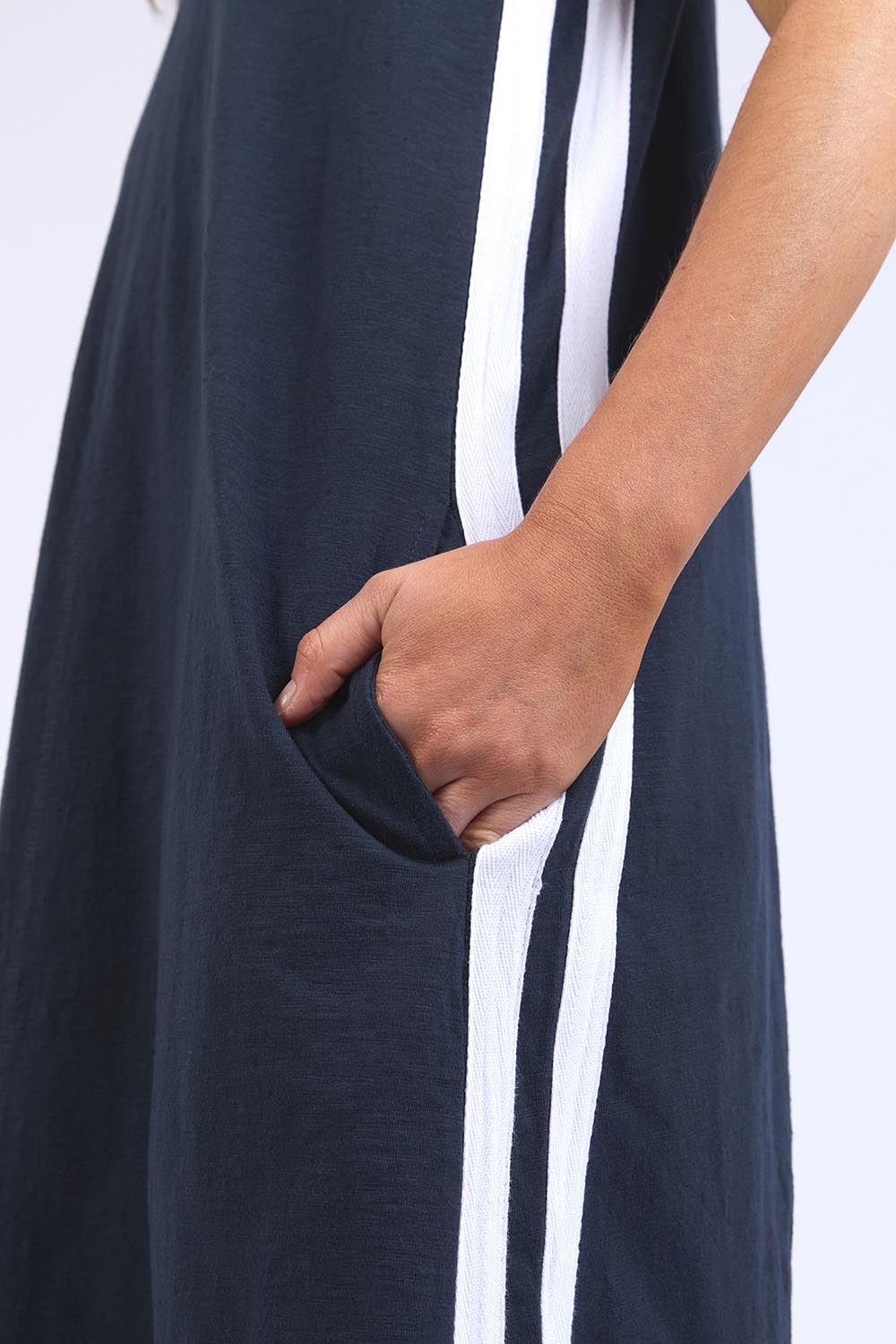 A model wearing the Leisure Recovery Cotton Dress in colour Navy (Blue), from the front, cropped image