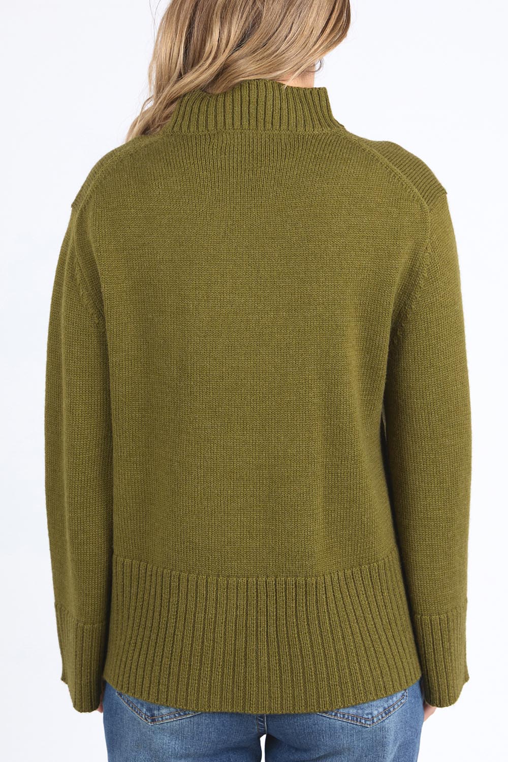 A model wearing the Jude Wool Blend Knit in colour Olivegree (Green), from the back