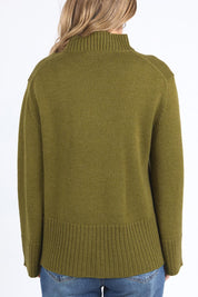 A model wearing the Jude Wool Blend Knit in colour Olivegree (Green), from the back