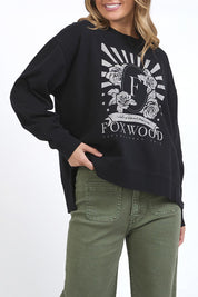 A model wearing the Happiness Cotton Crew in colour Washblack (Black), from the front, cropped image