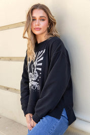 A model wearing the Happiness Cotton Crew in colour Washblack (Black), from the front, showing the whole outfit