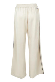 Product shot of the Traveller Pant in colour Bone, from the back
