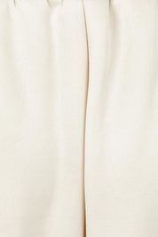 Product shot of the Traveller Pant in colour Bone, detail