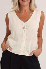 Model Sandy wearing size 10 of the Golden Vest in colour Vinwhite (White), from the front, cropped image