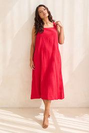 Model Tahnee wearing size 10 of the Lourdes Linen Blend Dress in colour Crimson (Red), from the front, showing the whole outfit