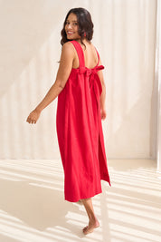 Model Tahnee wearing size 10 of the Lourdes Linen Blend Dress in colour Crimson (Red), from the front, showing the whole outfit