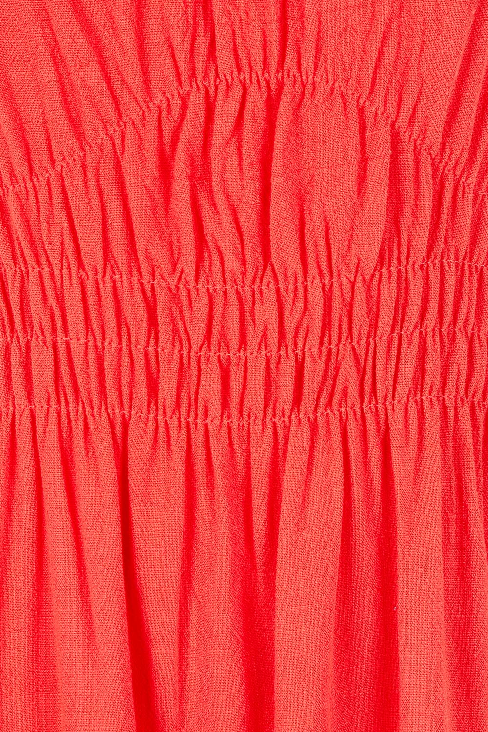 Product shot of the Dandelion Cotton Blend Dress in colour Tangelo, detail