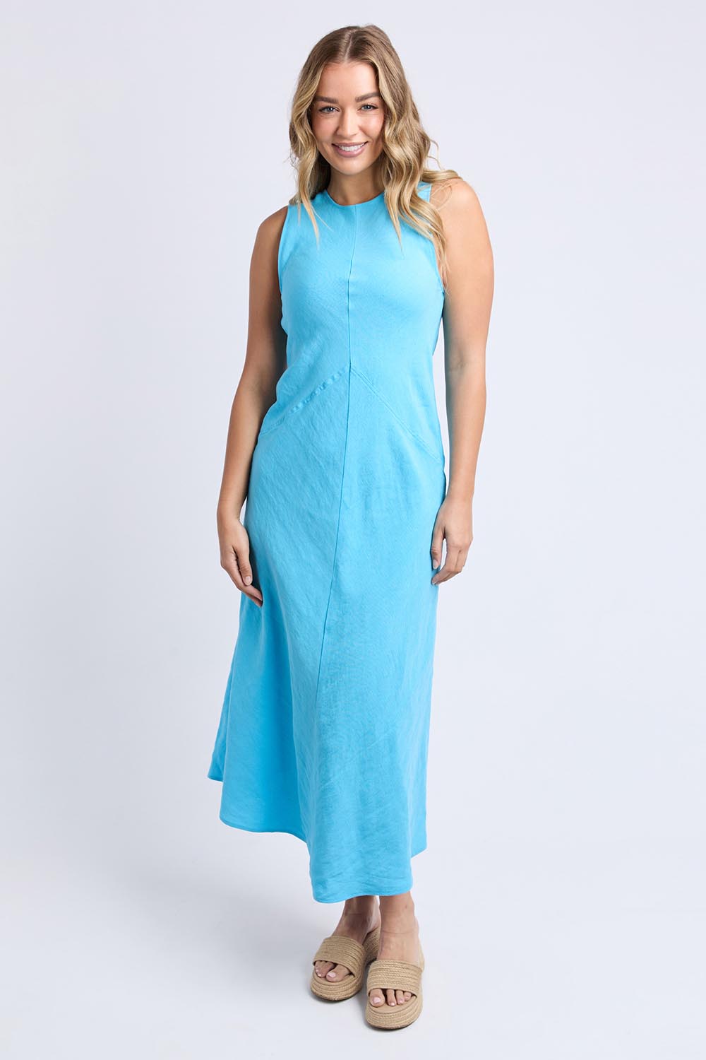 A model wearing the Azure Linen Blend Dress in colour Azureblue (Blue), from the front, showing the whole outfit