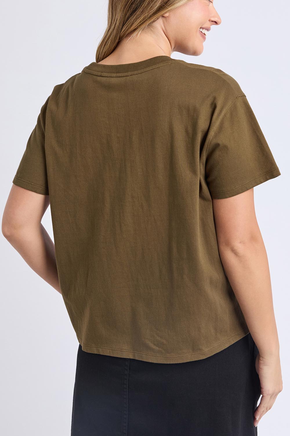 A model wearing the Arlington Cotton Tee in colour Darkolive (Green), from the back