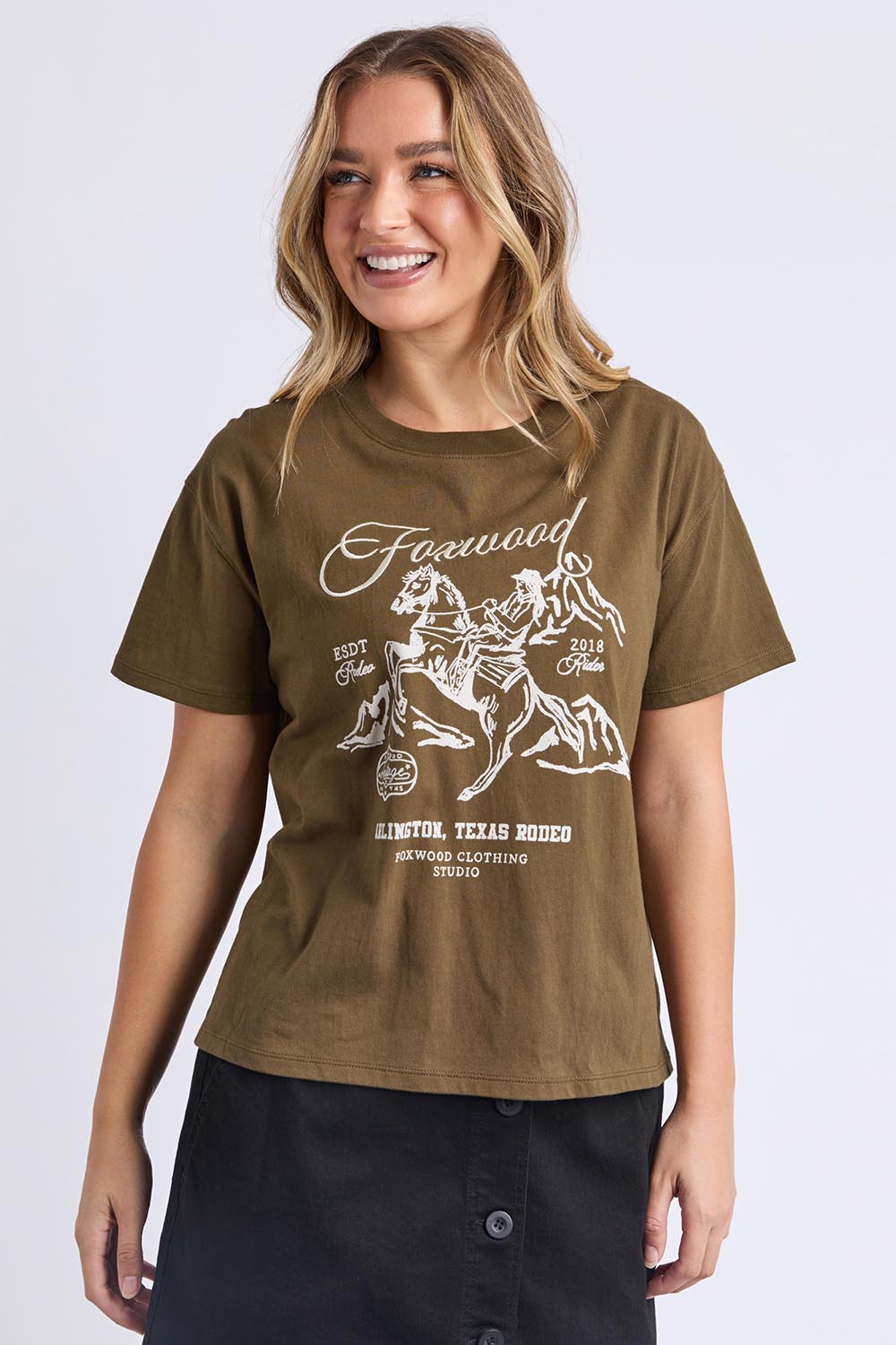 A model wearing the Arlington Cotton Tee in colour Darkolive (Green), from the front, cropped image