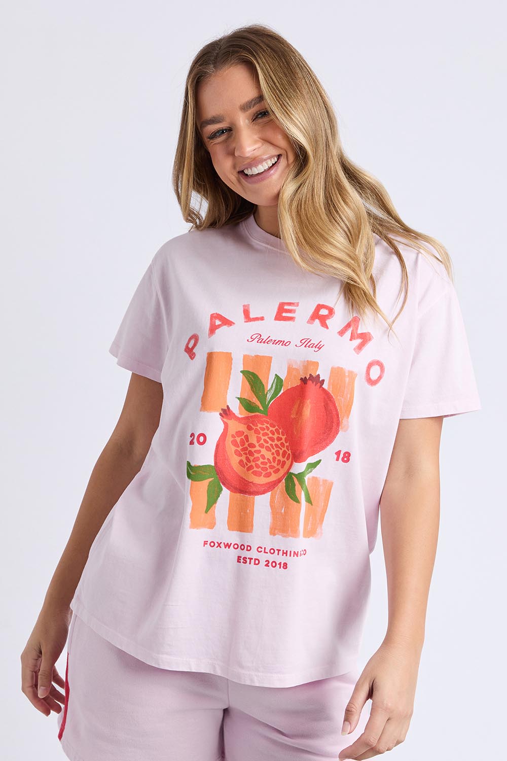A model wearing the Palermo Cotton Tee in colour Lavender (Purple), from the front, cropped image