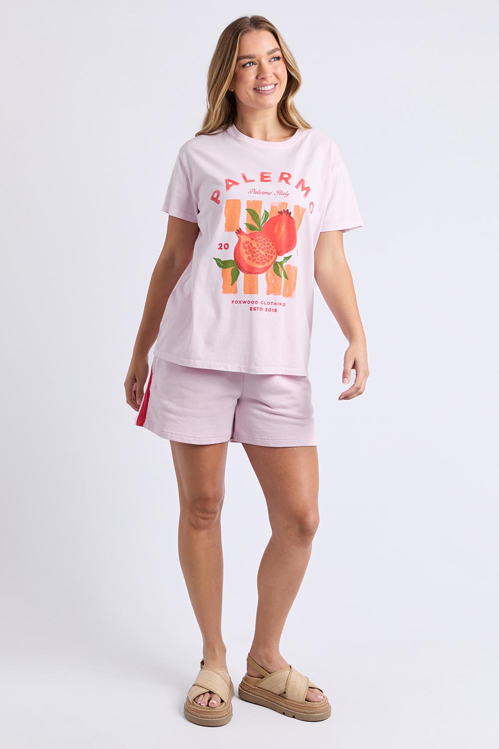 A model wearing the Palermo Cotton Tee in colour Lavender (Purple), from the front, showing the whole outfit