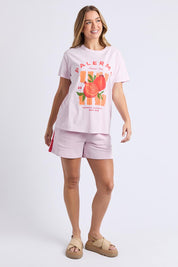 A model wearing the Palermo Cotton Tee in colour Lavender (Purple), from the front, showing the whole outfit