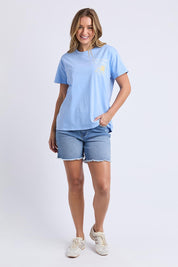 A model wearing the Club Cotton Tee in colour Blue (Blue), from the front, showing the whole outfit