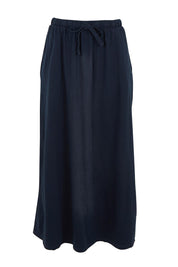 Product shot of the Evolve Cotton Skirt in colour Navy (Blue), from the front