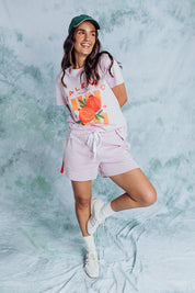 A model wearing the Palermo Cotton Short in colour Lavender (Purple), from the front, showing the whole outfit