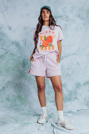 A model wearing the Palermo Cotton Short in colour Lavender (Purple), from the front, showing the whole outfit