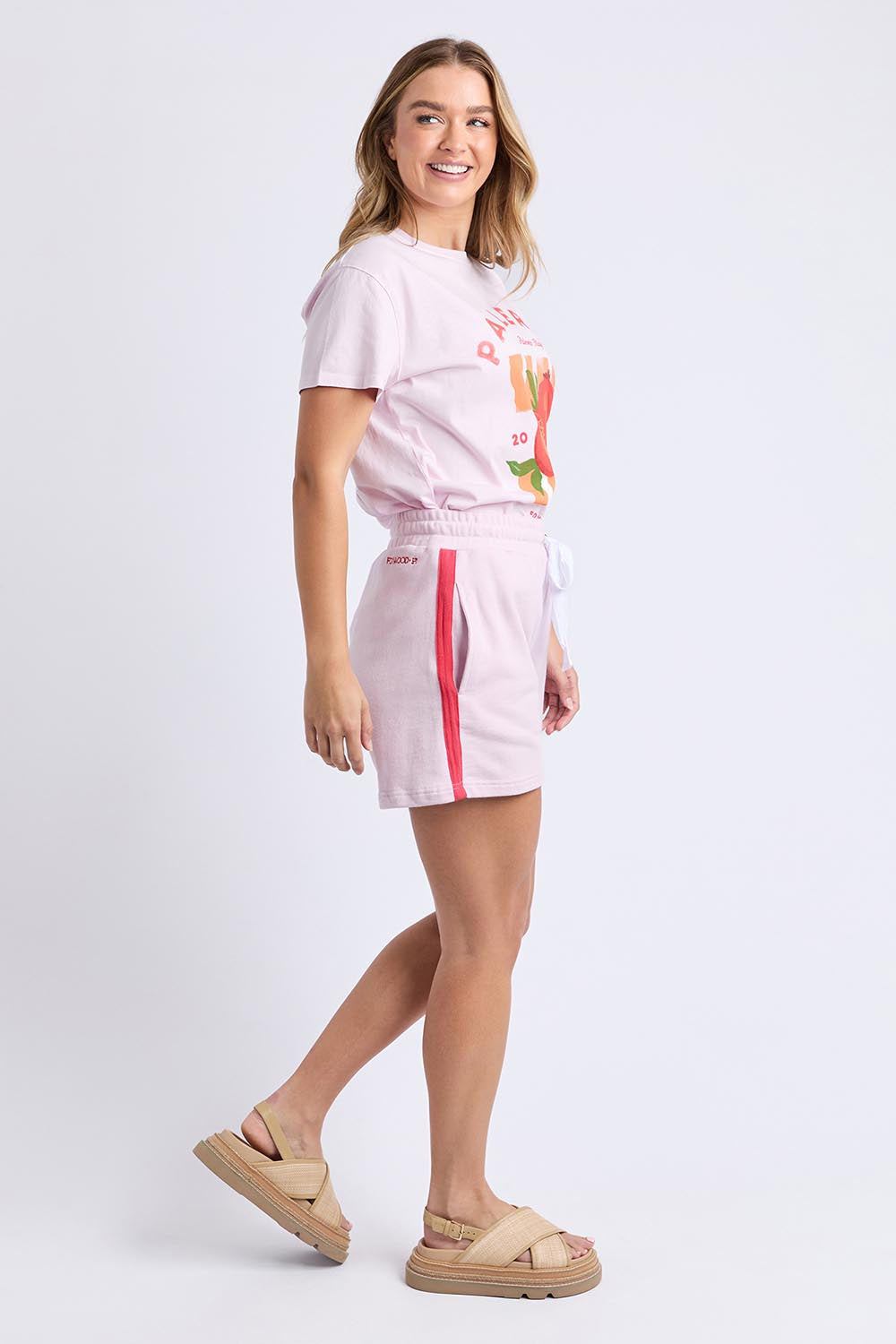 A model wearing the Palermo Cotton Short in colour Lavender (Purple), from the front, showing the whole outfit