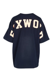 Product shot of the Interval Cotton Tee in colour Navy (Blue), from the back