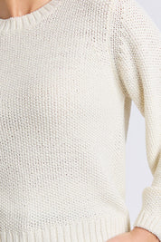 A model wearing the Blair Ls Knit in colour Vinwhite (White), from the front, cropped image